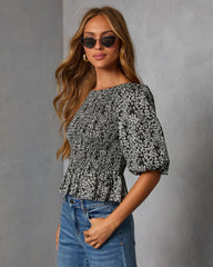 Crestal Puff Sleeve Peplum Top