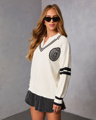 Jiles Embroidered Crest Partial Zip Sweater